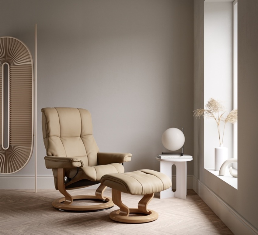 Stressless Mayfair recliner chair and matching footstool in a neutral interior